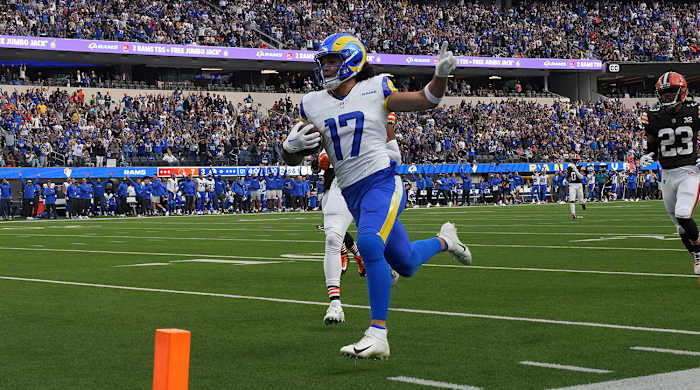 Puka Nacua runs toward the end zone for a touchdown against the Browns